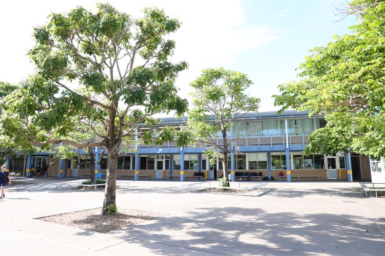 A photo of the school quad looking back at the classrooms.